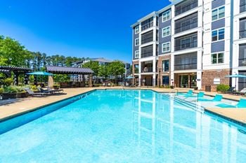 Resort-style saltwater pool with sundeck and wi-fi